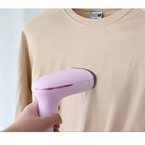 Plancha de vapor portátil rosa para planchado rápido en casa